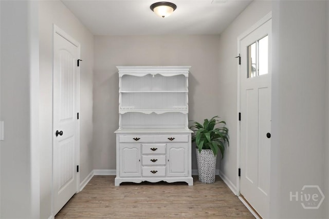 304 Boomer Ct, Guyton, GA 31312 - entrance foyer with light wood finished floors and baseboards