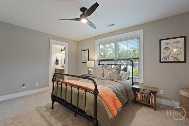 315 Linkside Lake Dr, Richmond Hill, GA 31324 - bedroom with carpet flooring, baseboards, ceiling fan, and connected bathroom