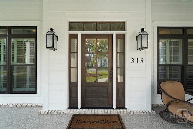 315 Linkside Lake Dr, Richmond Hill, GA 31324 - view of exterior entry featuring a porch