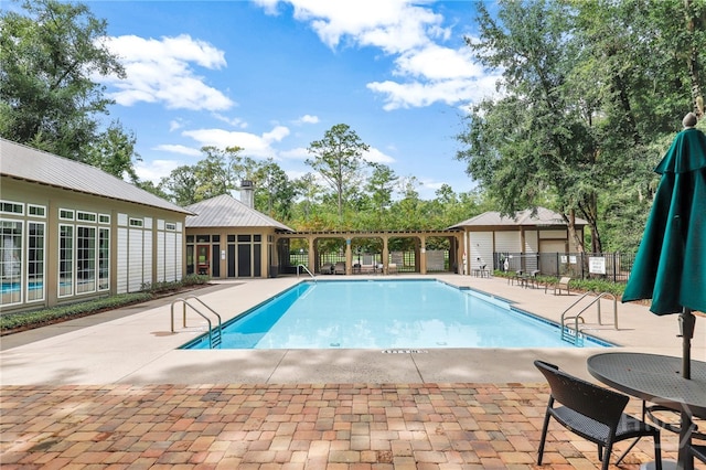 315 Linkside Lake Dr, Richmond Hill, GA 31324 - community pool with a patio area