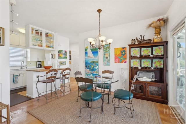 5 Northshore Dr, Tybee Island, GA 31328 - dining area with a chandelier