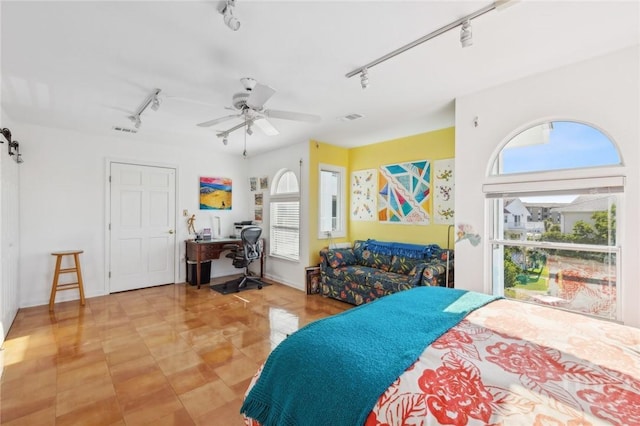 5 Northshore Dr, Tybee Island, GA 31328 - bedroom with track lighting, a desk, and ceiling fan