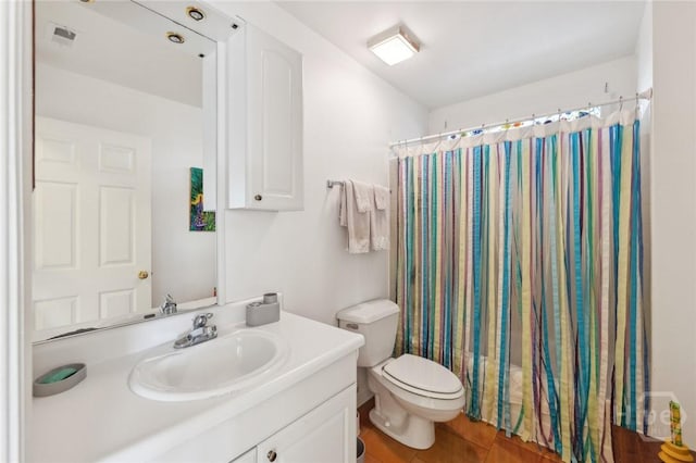 5 Northshore Dr, Tybee Island, GA 31328 - full bathroom featuring vanity, toilet, and a shower with shower curtain