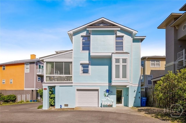 5 Northshore Dr, Tybee Island, GA 31328 - raised beach house featuring a garage and driveway