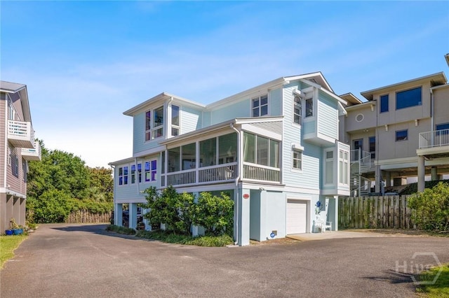 5 Northshore Dr, Tybee Island, GA 31328 - view of front of property with driveway and an attached garage