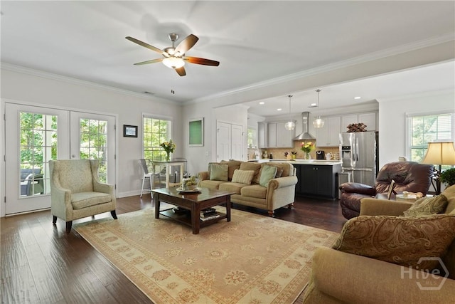 20 Oakcrest Ct, Savannah, GA 31405 - living area with healthy amount of natural light, a ceiling fan, dark wood-type flooring, ornamental molding, and baseboards