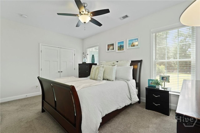 20 Oakcrest Ct, Savannah, GA 31405 - carpeted bedroom featuring baseboards, a closet, and ceiling fan