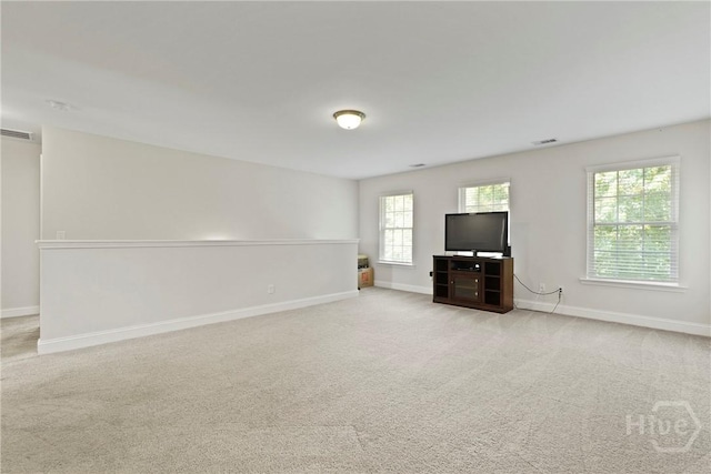 20 Oakcrest Ct, Savannah, GA 31405 - unfurnished living room with light colored carpet and baseboards