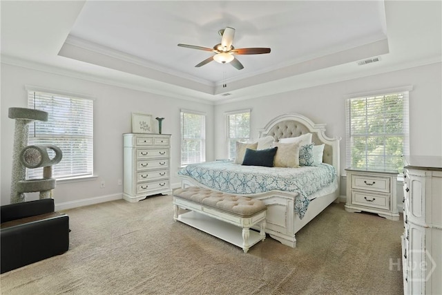 20 Oakcrest Ct, Savannah, GA 31405 - bedroom featuring a raised ceiling, ornamental molding, multiple windows, carpet floors, and baseboards