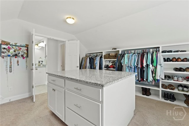 20 Oakcrest Ct, Savannah, GA 31405 - walk in closet with vaulted ceiling and light carpet