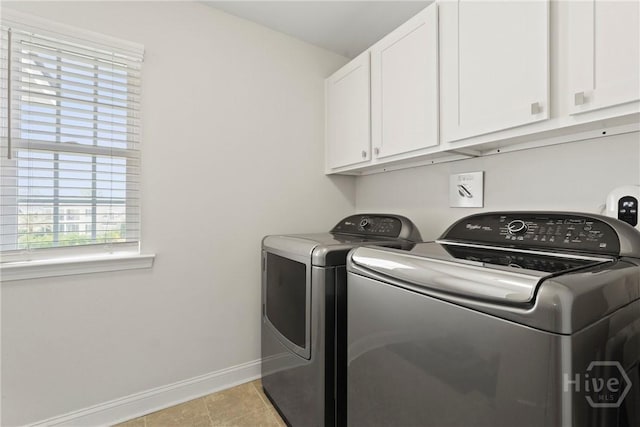 20 Oakcrest Ct, Savannah, GA 31405 - laundry room with cabinet space, washer and dryer, baseboards, and light tile patterned floors