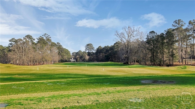 20 Oakcrest Ct, Savannah, GA 31405 - view of home's community featuring view of golf course, view of scattered trees, and a lawn