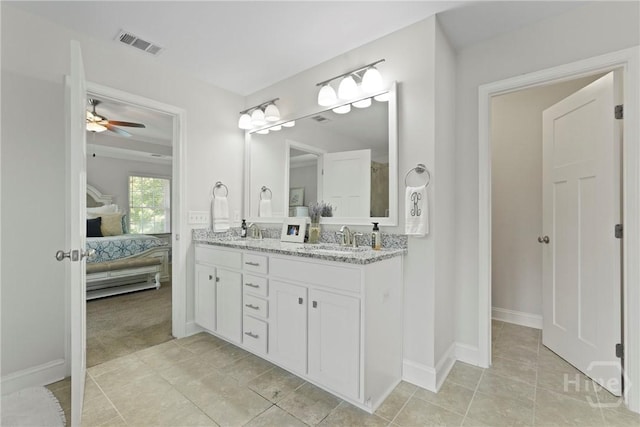 20 Oakcrest Ct, Savannah, GA 31405 - bathroom featuring connected bathroom, double vanity, a ceiling fan, baseboards, and tile patterned floors