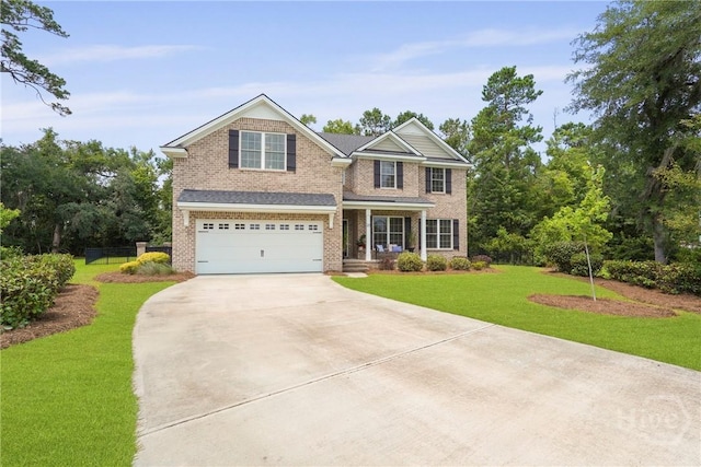 20 Oakcrest Ct, Savannah, GA 31405 - view of front facade featuring concrete driveway, an attached garage, brick siding, and covered porch