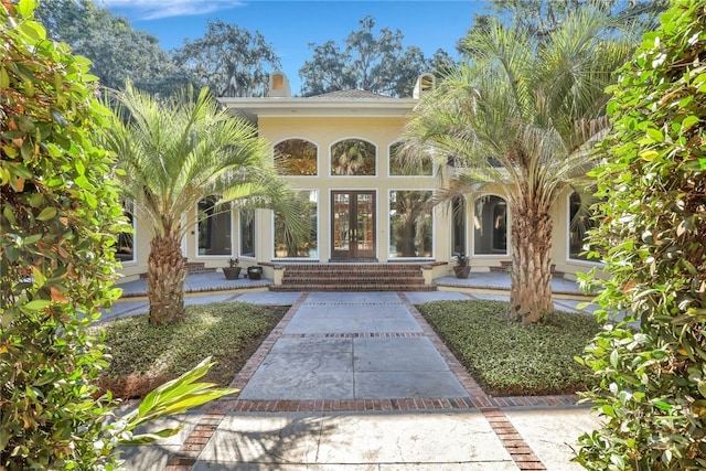 3 Elcy Ln, Savannah, GA 31411 - entrance to property featuring french doors and stucco siding