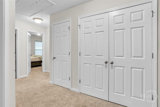 194 Calm Oaks Cir, Savannah, GA 31419 - hallway with attic access, carpet floors, and baseboards