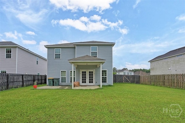194 Calm Oaks Cir, Savannah, GA 31419 - rear view of property with french doors and a patio