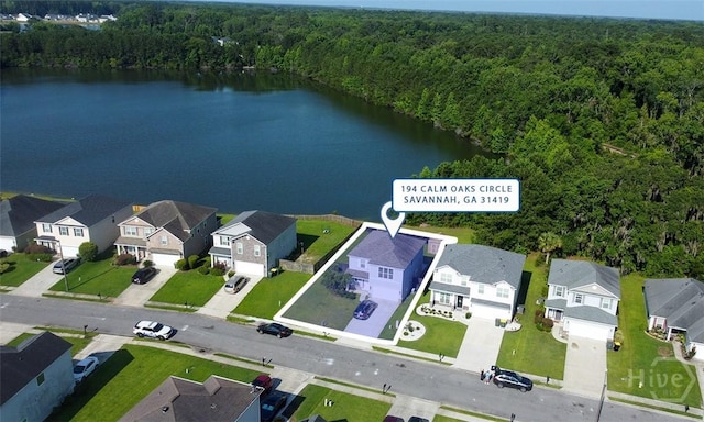 194 Calm Oaks Cir, Savannah, GA 31419 - view of property location featuring a heavily wooded area, a large body of water, and nearby suburban area