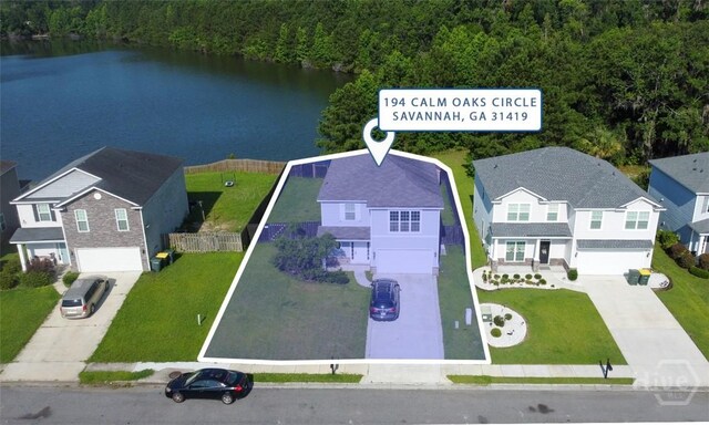 194 Calm Oaks Cir, Savannah, GA 31419 - aerial view of residential area featuring a forest and a large body of water