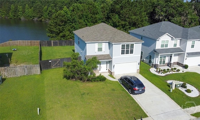 194 Calm Oaks Cir, Savannah, GA 31419 - view of front of property with driveway, an attached garage, a water view, a view of trees, and a shingled roof