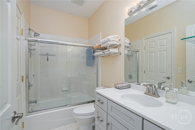 6 Pine Shadow Ct, Savannah, GA 31411 - bathroom featuring vanity, enclosed tub / shower combo, toilet, and tile patterned floors