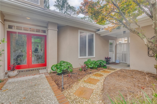 6 Pine Shadow Ct, Savannah, GA 31411 - entrance to property with french doors and stucco siding