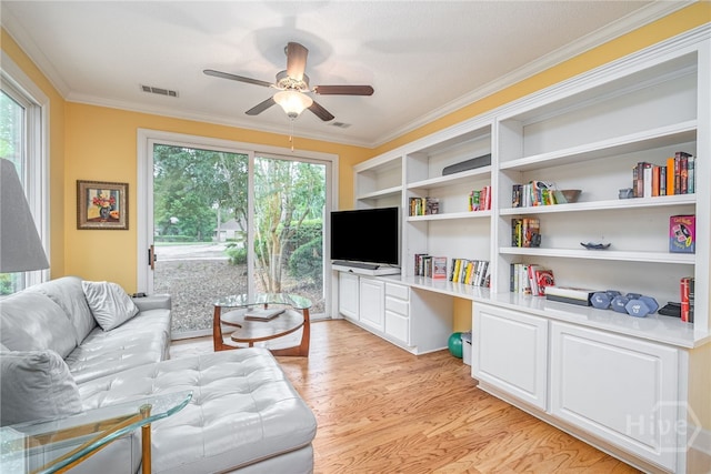 6 Pine Shadow Ct, Savannah, GA 31411 - living area with ornamental molding, light wood-type flooring, ceiling fan, and plenty of natural light