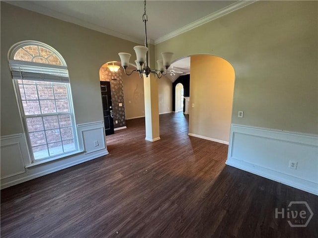 415 Copper Creek Cir, Pooler, GA 31322 - unfurnished dining area featuring arched walkways, crown molding, a chandelier, healthy amount of natural light, and dark wood finished floors