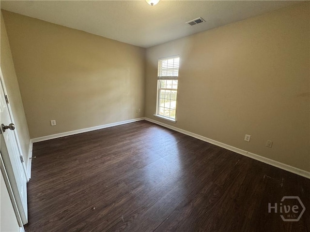 415 Copper Creek Cir, Pooler, GA 31322 - empty room with dark wood-type flooring and baseboards
