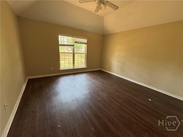 415 Copper Creek Cir, Pooler, GA 31322 - empty room featuring dark wood-style floors, ceiling fan, baseboards, and vaulted ceiling
