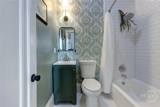 123 W Park Ave Unit 2, Savannah, GA 31401 - bathroom featuring toilet, vanity, shower / bath combo with shower curtain, tile patterned flooring, and baseboards