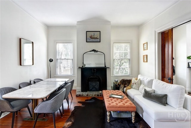 123 W Park Ave Unit 2, Savannah, GA 31401 - living area with wood finished floors, a fireplace with raised hearth, and crown molding