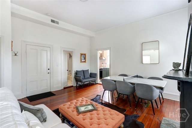 123 W Park Ave Unit 2, Savannah, GA 31401 - living area with wood finished floors and crown molding