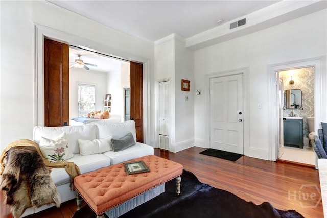 123 W Park Ave Unit 2, Savannah, GA 31401 - living area with dark wood-type flooring, ceiling fan, and ornamental molding