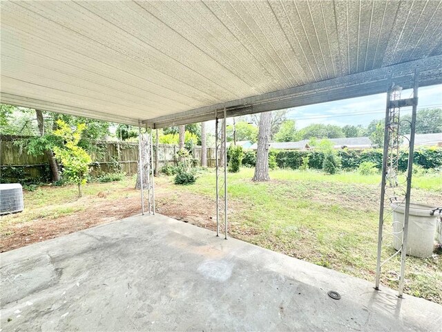 5 Ossabaw Rd, Savannah, GA 31410 - fenced backyard featuring a patio and a carport
