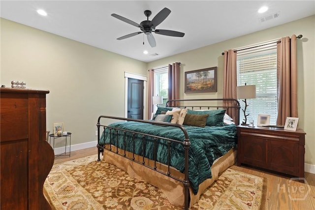 39 Bird Dog Ln, Midway, GA 31320 - bedroom featuring light wood-style flooring, baseboards, a ceiling fan, and recessed lighting