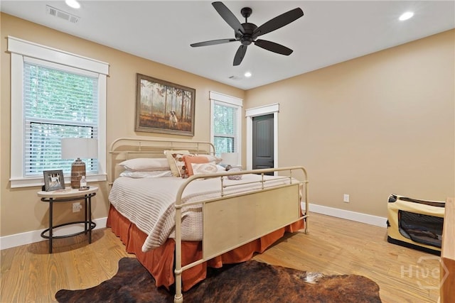 39 Bird Dog Ln, Midway, GA 31320 - bedroom with baseboards, wood finished floors, recessed lighting, and ceiling fan
