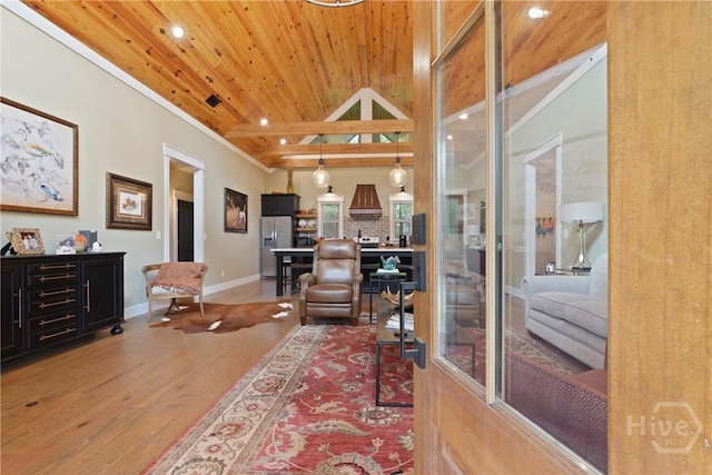 39 Bird Dog Ln, Midway, GA 31320 - living area with wood ceiling, light wood-style flooring, baseboards, vaulted ceiling, and recessed lighting