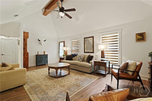 152 Covey Rise Pl, Midway, GA 31320 - living area featuring beamed ceiling, ceiling fan, high vaulted ceiling, wood finished floors, and baseboards