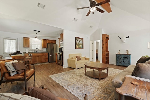 152 Covey Rise Pl, Midway, GA 31320 - living area featuring ceiling fan, lofted ceiling, and wood finished floors