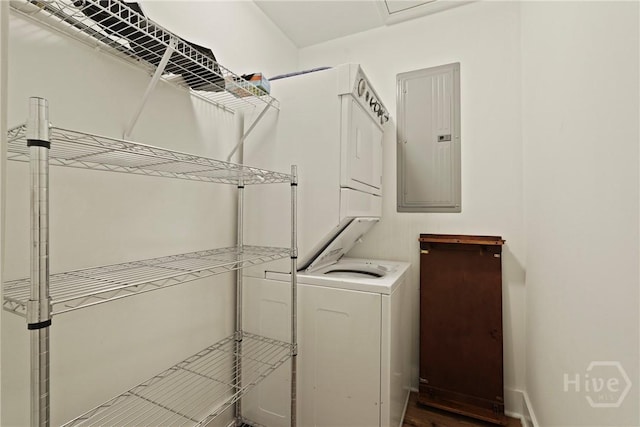 152 Covey Rise Pl, Midway, GA 31320 - laundry room featuring electric panel and stacked washer / drying machine