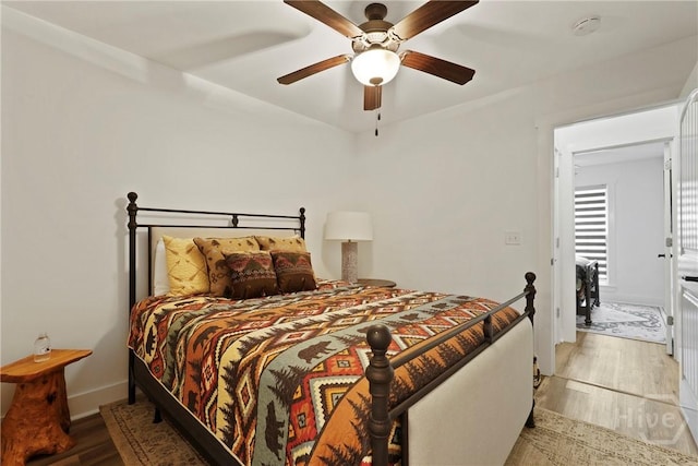 152 Covey Rise Pl, Midway, GA 31320 - bedroom featuring light wood-type flooring, ceiling fan, and baseboards