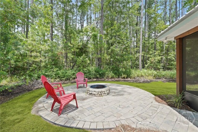 152 Covey Rise Pl, Midway, GA 31320 - view of patio / terrace with an outdoor fire pit