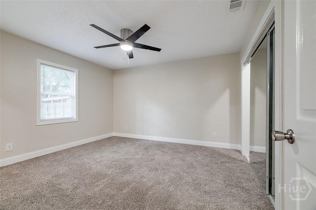 405 E 3rd St, Springfield, GA 31329 - unfurnished bedroom featuring carpet flooring, baseboards, a ceiling fan, and a closet