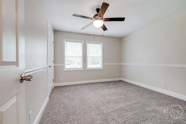 405 E 3rd St, Springfield, GA 31329 - spare room featuring ceiling fan, carpet floors, a textured ceiling, and baseboards
