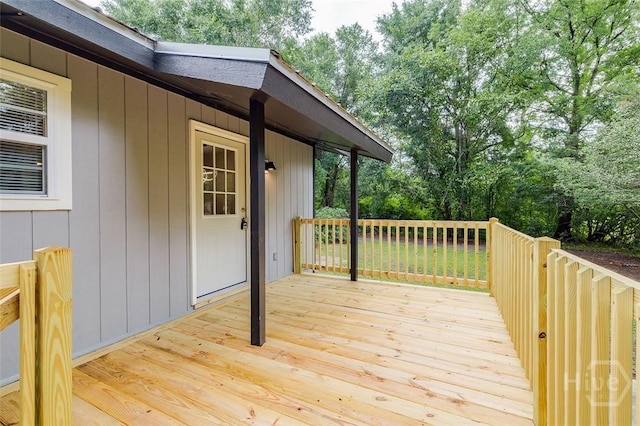 405 E 3rd St, Springfield, GA 31329 - wooden deck featuring view of wooded area