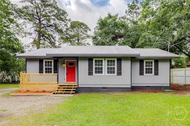 405 E 3rd St, Springfield, GA 31329 - view of front of house featuring crawl space and metal roof