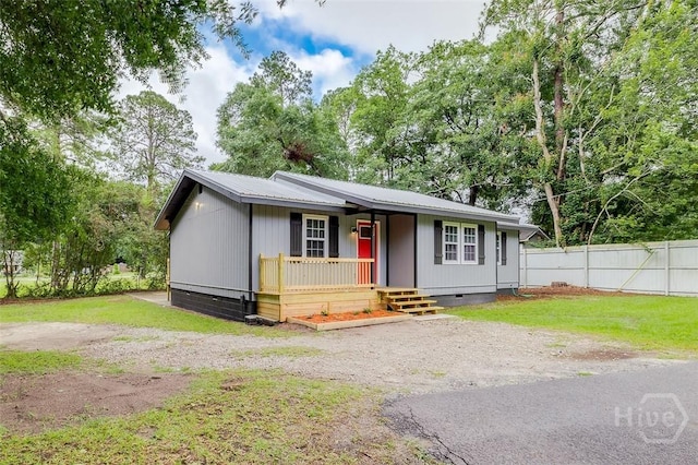 405 E 3rd St, Springfield, GA 31329 - ranch-style house with crawl space, a porch, and metal roof