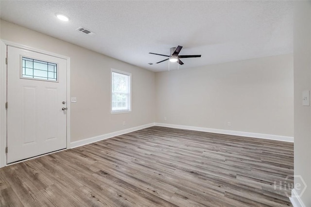 405 E 3rd St, Springfield, GA 31329 - entryway featuring healthy amount of natural light, wood finished floors, ceiling fan, baseboards, and recessed lighting