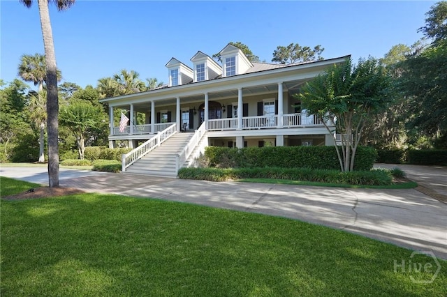 120 Marsh Harbor Dr S, Savannah, GA 31410 - view of front of property featuring covered porch, stairs, and a front yard